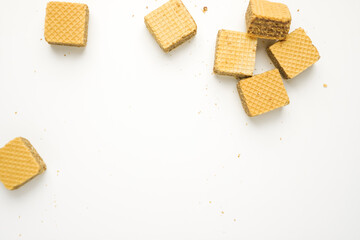 Cube wafer with chocolate cream on isolated white background