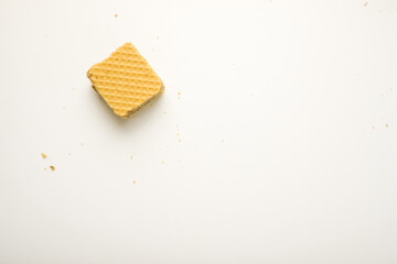 Cube wafer with chocolate cream on isolated white background