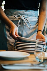 close up of hands holding cutlery