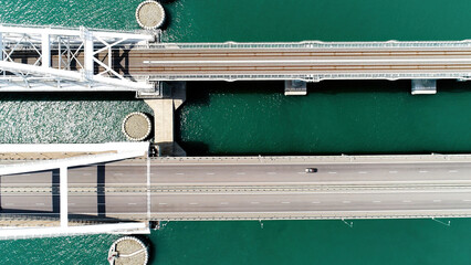 A huge bridge is a bird's-eye view. Action. A long new bridge built for the movement of transport...