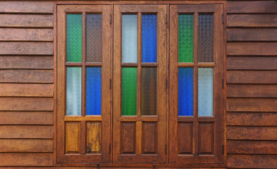 vintage wooden windows with retro stained glass