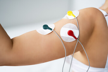 Electrode Arm Stimulation And Training. Pain Therapy