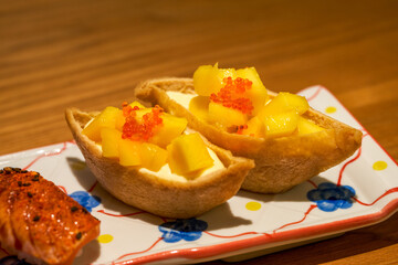 A classic and delicious Japanese dish, mango tofu skin sushi