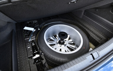 Spare wheel in the trunk of a modern car