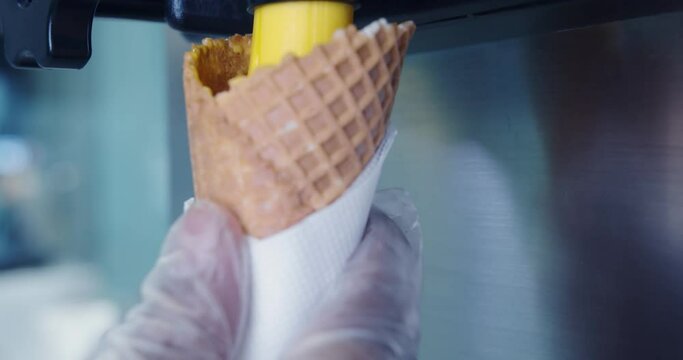 ice cream machine for cooking and making delicious mango ice cream. closeup shot