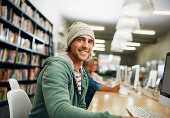 Studying is tough, but its rewarding. Cropped portrait of a young male university student studying...
