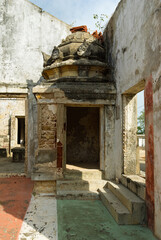 Fototapeta na wymiar Remains of a war damaged and abandoned hindu temple