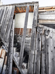 Weathered wood stairs in winter unsafe for walking
