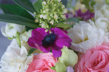 Decorative bouquet of many different small and large flowers