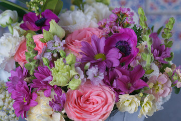 Decorative bouquet of many different small and large flowers