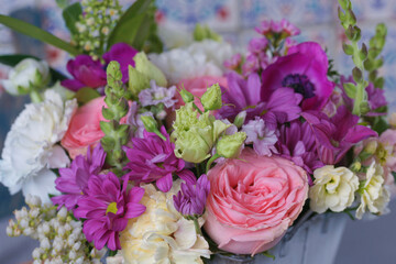 Decorative bouquet of many different small and large flowers