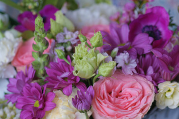Decorative bouquet of many different small and large flowers