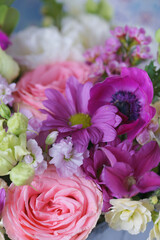 Decorative bouquet of many different small and large flowers