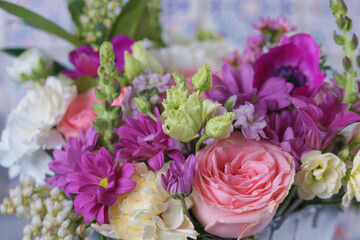 Decorative bouquet of many different small and large flowers