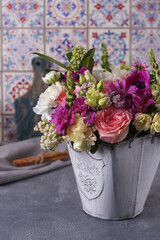 Decorative bouquet of many different small and large flowers