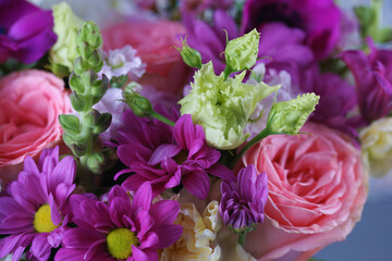 Decorative bouquet of many different small and large flowers