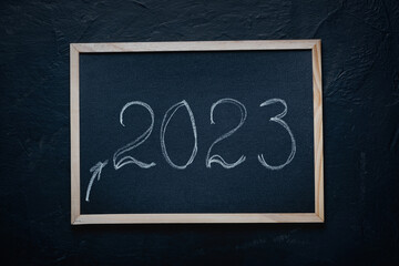Inscription in chalk on a blackboard. School board, date 2023