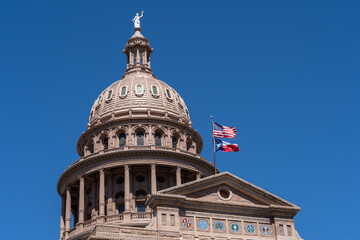 Top part of the Texas State Capitol building is shown. The Texas State Capitol is the capitol and...