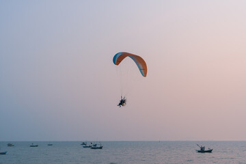 paraglider over the sea
