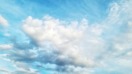 Naklejka na ściany i meble blue sky with clouds background wallpaper