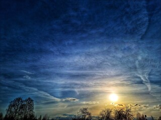 Fototapeta premium sky with clouds and sun background wallpaper, sunset
