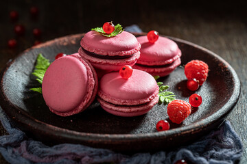Homemade and sweet red currant macaroons made of fresh berries.