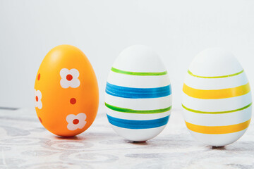 Easter. Multicolored eggs. Yellow and blue Easter decorations.