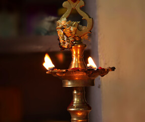 Indian Traditional Silver Oil Lamp Varalakshmi, Kuthu Vilakku, Brass Traditional Ornamental Lamp. with blur background