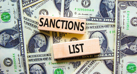 Sanctions list symbol. Wooden blocks with concept words Sanctions list on beautiful background from...