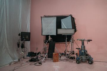 Film set, monitors and modern shooting equipment. Film crew, lighting devices, monitors, playbacks...