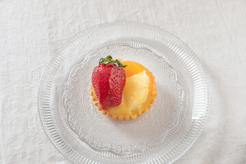 Small tartlet with custard and fresh fuit.