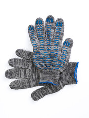 Construction gloves with reinforced finger impregnation on a white isolated background