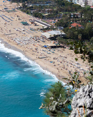 people on the beach and the sea