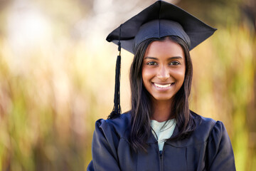 Look out world, Im coming. Cropped portrait of an attractive young female student celebrating on...