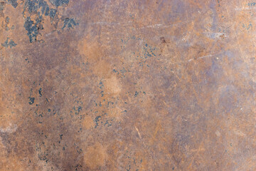Brown color rustic metal sheet with scratches and spots