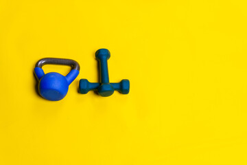 Space kettlebell isolated blue yellow ackground fitness iron object, for lifting equipment in barbell and weight wellness, wellbeing simplicity. Kg hand medical,