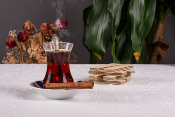 a glass of hot turkish tea on the table