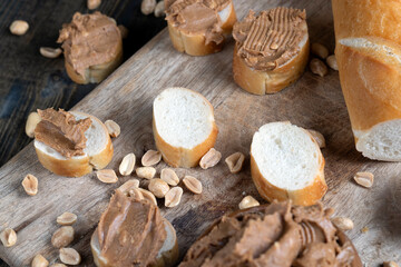 nut food on a cutting wooden board in the kitchen
