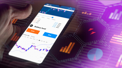 Exchange-traded fund chart, stock market etf data on smartphone. Business analysis of a trend. Invest in shares entreprises batteries ETF. Buying strategic battery fund