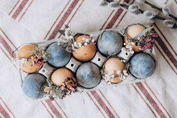 festively decorated Easter eggs painted with natural blue headlights by soaking in tea hyacinth tea