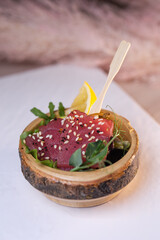 Obraz na płótnie Canvas tuna sliced bruschetta with sesame seeds close-up