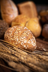 Assortment of fresh crusty bread of different types. Bakery products.