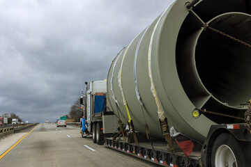 Trailer truck exceptional transport of bulky goods on the highway