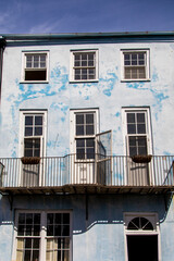 Windows and doors on a faded house