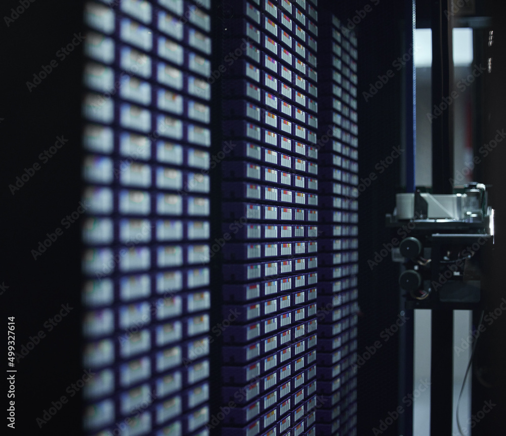 Poster all your data, safe in one place. cropped shot of the inside of a network server room.