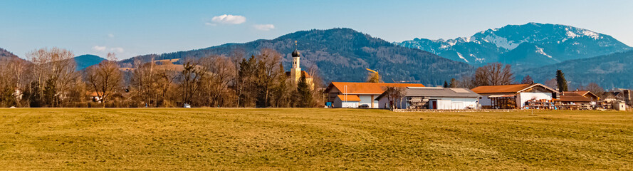 Fototapeta premium Beautiful alpine winter view with a church near Bad Toelz, Bavaria, Germany