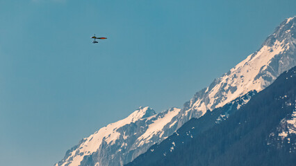 Naklejka na ściany i meble Beautiful alpine winter view with a hang-glider near Telfs, Tyrol, Austria