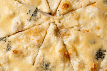 Four cheese pizza quattro formaggi close up photo.