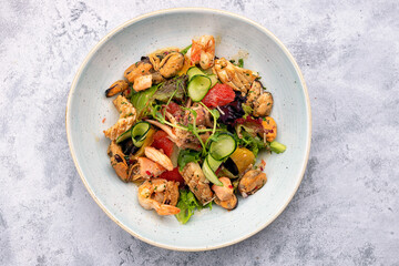 Salad with seafood, vegetables and herbs