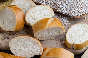 pieces of wheat baguette on a cutting board